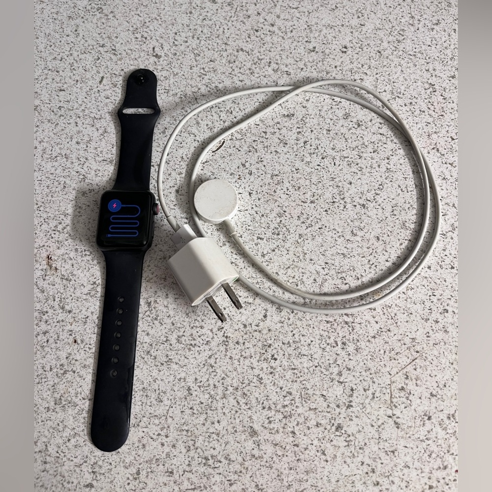 Black Apple Watch 3 with Charger